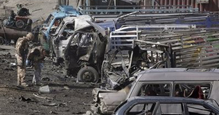 Suicide attacks kill 12 before Afghan vote